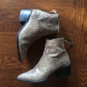 Brown snakeskin booties with heel